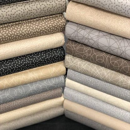 Modern fabrics often are geometric or abstract in design.  Affinity For Quilts has a growing selection of these fabrics.